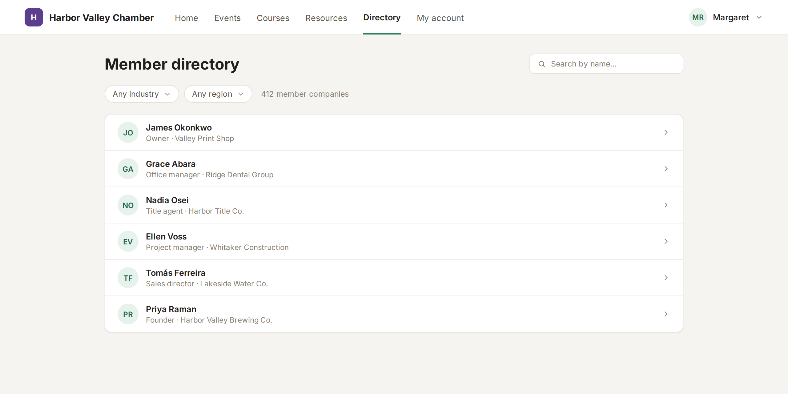 A member directory in the FullRoster portal filtered by industry